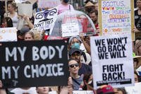People protest the Supreme Court's decision to overturn Roe v. Wade.