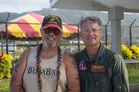A Marine Corps veteran and Marine Corps Colonel smile in America Samoa.