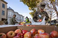 U.S. Marines and sailors participate in a food bank donation in San Francisco.