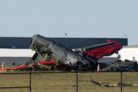 Debris from two planes that crashed during an airshow at Dallas Executive Airport