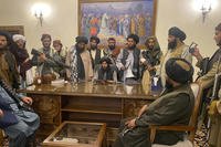 Taliban fighters take control of the Afghan presidential palace in Kabul, Afghanistan, after President Ashraf Ghani fled the country