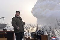 North Korean leader Kim Jong Un supervises what it says is a test of "high-thrust solid-fuel motor"