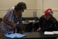 Darrell Kunisake, the manager of Samuel Adams Sports Grill, conducts an interview with a potential employee during a Marine Corps Community Services job fair aboard Marine Corps Base Hawaii.