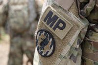 Military police members with 89th Military Police, Fort Hood, Texas, receive a convoy brief.