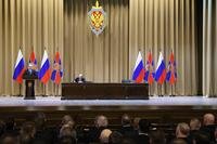 Russian President Vladimir Putin delivers his speech during a meeting of the Federal Security Service board