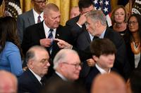 Jon Stewart speaks to Jerry Ensminger, a Camp LeJeune survivor.