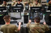 Airmen compete in a Video Game LAN tournament.