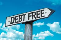 A road sign points to "debt free"