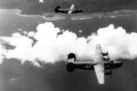 U.S. Army B-24 bomber planes fly toward Japanese installations in the Solomon Islands.
