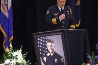Fargo Police Chief David Zibolski speaks during funeral services.