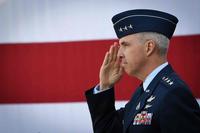 Lt Gen. Stephen Whiting salutes during a change of command ceremony