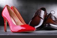 shiny red shoe and shiny brown shoe