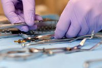 Senior Airman Alexis Lopez, a dental assistant with the 319th Medical Group, lays out an array of dental instruments used in routine checkups and procedures at the medical treatment facility on Grand Forks Air Force Base, N.D. 