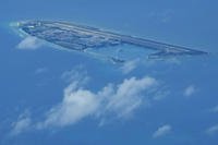 Chinese structures and buildings on the man-made Fiery Cross Reef at the Spratlys group of islands in the South China Sea