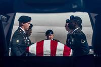 Soldiers move the remains of an service member MIA from the Korean War