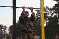 A U.S. Army Ranger performs pull-ups during the 35th annual David E. Grange Jr. Best Ranger Competition on Fort Benning, Georgia.