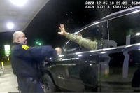 police officer uses a spray agent on Caron Nazario