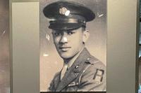 Exhibit featuring Waverly Bernard Woodson Jr. at the visitors center of the Normandy American Cemetery in Colleville-sur-Mer overlooking Omaha Beach. (Courtesy Stephen Woodson) Exhibit featuring Waverly Bernard Woodson Jr. at Normandy American Cemetery visitors center
