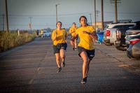 Sailors take part in the 1.5 mile run