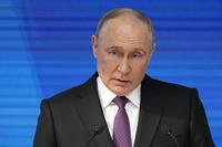 Russian President Vladimir Putin delivers his state-of-the-nation address in Moscow