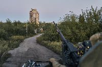 Ukrainian soldier sits in his position in Avdiivka, Donetsk region, Ukraine