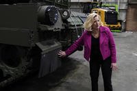 Secretary of the Army Christine Wormuth looks over the latest version of the M1A2 Abrams main battle tank