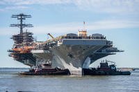 Nimitz-class aircraft carrier USS John C. Stennis is moved to an outfitting berth in Newport News