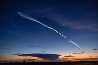 The launch of SpaceX Falcon 9 rocket with 22 Starlink satellites is viewed from Huntington Beach