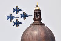 Jets fly past the Naval Academy Chapel dome