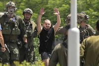 Almog Meir Jan kidnapped in a Hamas-led attack arrives at the Sheba Medical Center in Israel.
