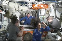 NASA astronauts Butch Wilmore and Suni Williams are greeted by the crew of the International Space Station