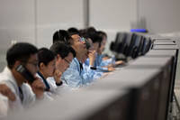 technical personnel work at the Beijing Aerospace Control Center (BACC) in Beijing