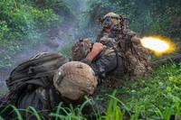 Army sniper fires blanks during exercise at Fort Magsaysay, Philippines