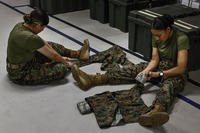 New Marines conduct uniform maintenance in preparation for Family Day