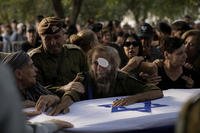 Flagged-covered coffin of Israeli soldier Sgt. Amitai Alon