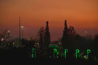 A hazy smog from fires at the Aberdeen Proving Ground mutes the sunset seen from Route 24 near I-95, where a putrid smoky smell also fills the air.