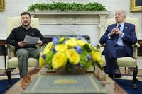 President Joe Biden, right, listens as Ukraine's President Volodymyr Zelenskyy, left, speaks