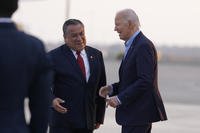 President Joe Biden greets Peru's Prime Minister Gustavo Adrianzen