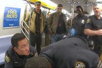 Daniel Penny looks on as NYC police officers attempt to revive Jordan Neely