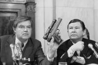 Chairman Frank Church, D- Idaho., the Senate Intelligence Committee, holds up a poison daft gun as co-chairman John G. Tower, R-Texas looks at the weapon during a session the panel's probe of the Central Intelligence Agency Tuesday, Sept. 17, 1975 in Washington.