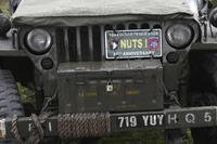 A vintage American jeep is parked during the 80th commemoration of the Battle of the Bulge in Bastogne, Belgium.