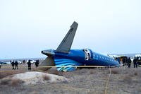 A part of Azerbaijan Airlines' Embraer 190 lies on the ground near the airport of Aktau, Kazakhstan.