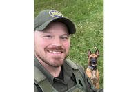 U.S. Border Patrol agent David Maland and his K9 partner, Cora
