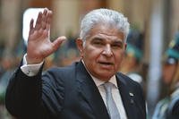 Panama's President Jose Mulino waves as he arrives at Congress