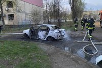 Rescue workers work on a site after Russian rocket strike.