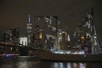 A masted Mexican Navy training ship, the Cuauhtémoc, sits stranded after colliding with the Brooklyn Bridge