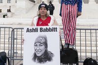 Micki Witthoeft, mother of Ashli Babbitt, joins protesters outside the Supreme Court