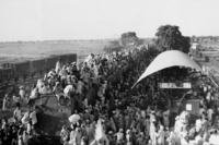 Muslim refugees crowd onto a train bound for Pakistan.