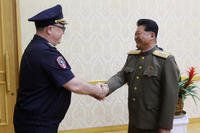 North Korean Public Security Minister Pang Tu Sop, right, meets with Russian Vice Interior Minister Vitaly Shulika