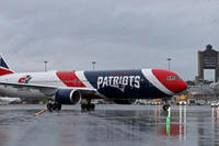 The New England Patriots football team's jet taxis on the tarmac, Thursday, April 2, 2020, at Logan Airport